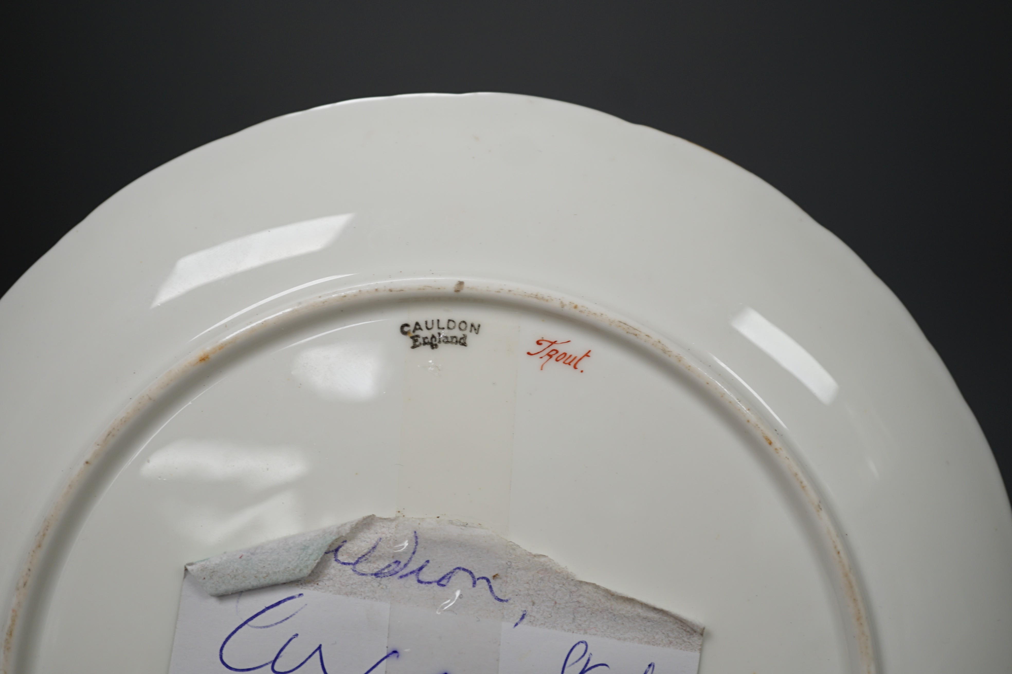 Joseph Birbeck Senior for Cauldon, a cabinet plate painted with a leaping salmon, signed, 22cm diameter